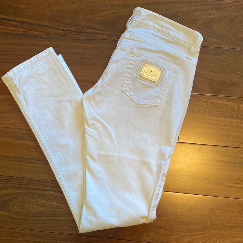 Jean Paul Gaultier white jeans size 29 but fit’s smaller, more like 26-27.